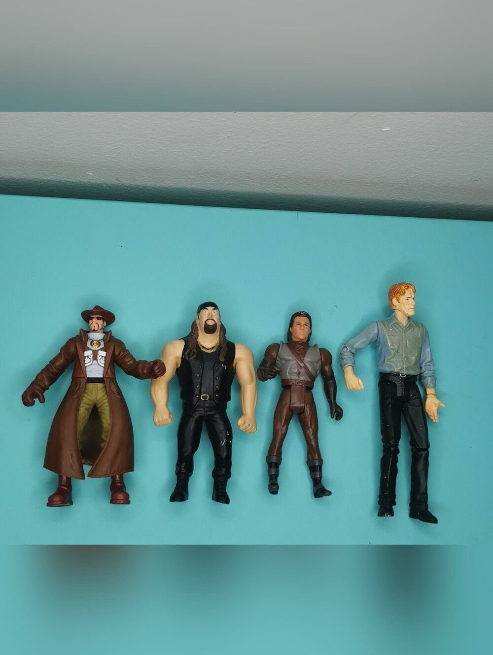 Set of 4 Pre-Owned Collectible Action Figures